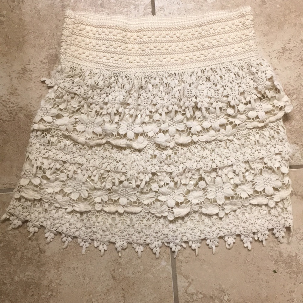 White eyelet mini skirt